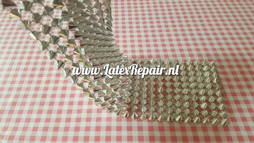 Lapje plastic zilver studs ± 10x34 cm